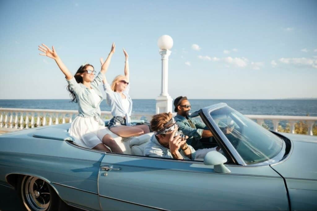 group driving in car