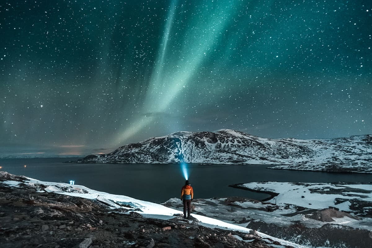 northern lights sky with mountains