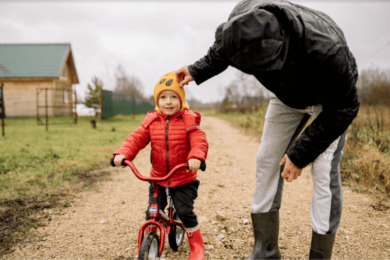 father and son biking